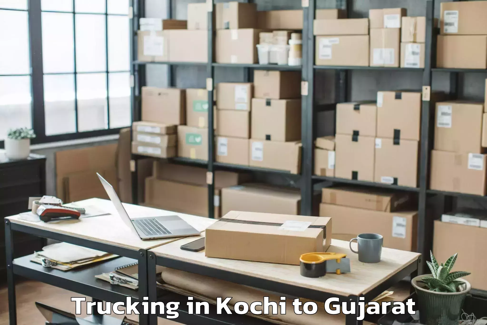 Book Kochi to Gusar Trucking Online